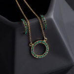Megberry Circle of Life Emerald & Gold Pendant & Earrings