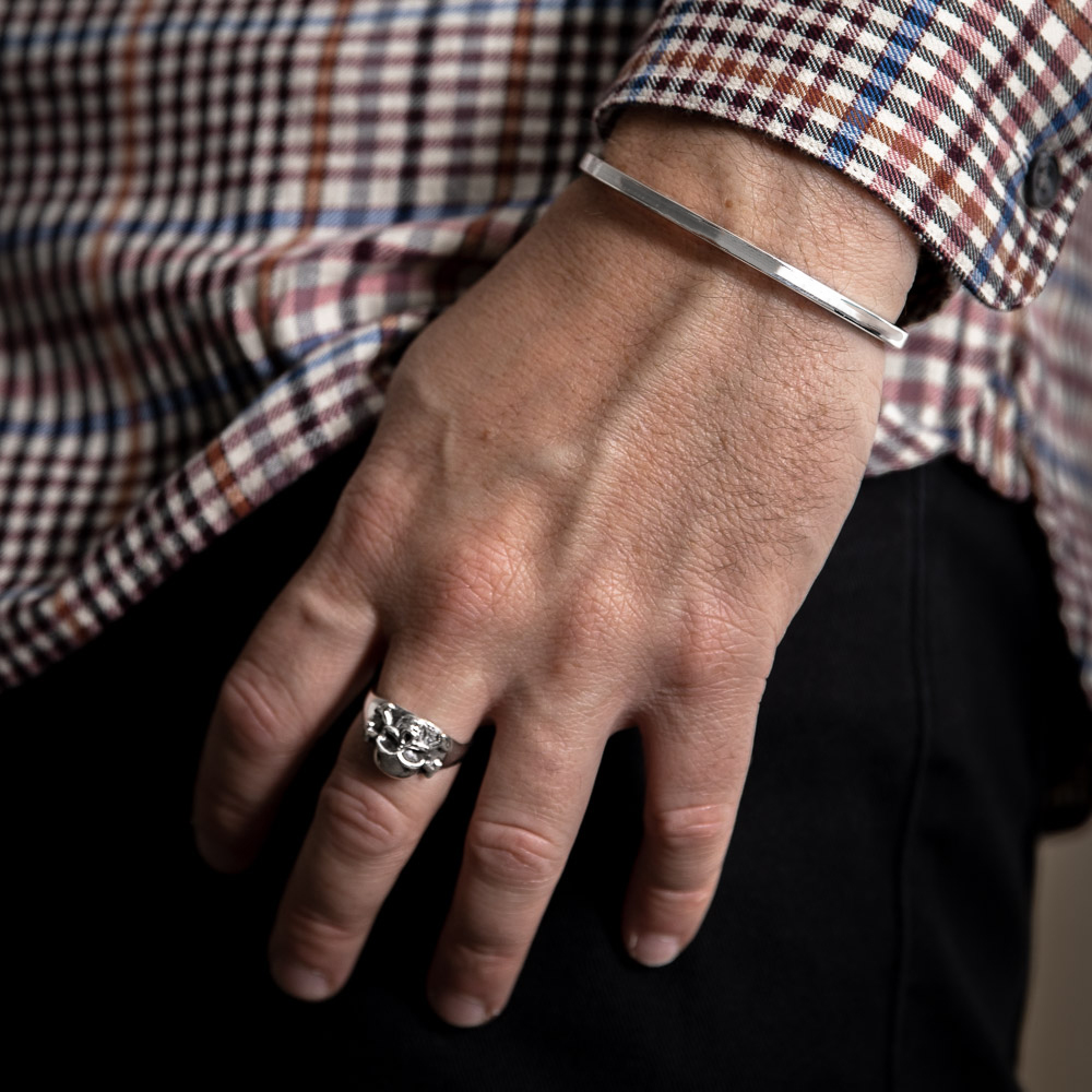 Men wearing ring & bracelet